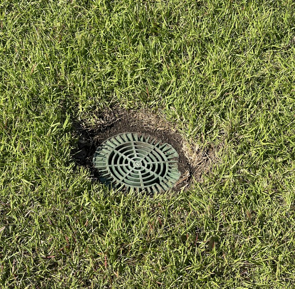 The Dye Club at Barefoot Resort Fairway Drainage Plastic Grate Installation